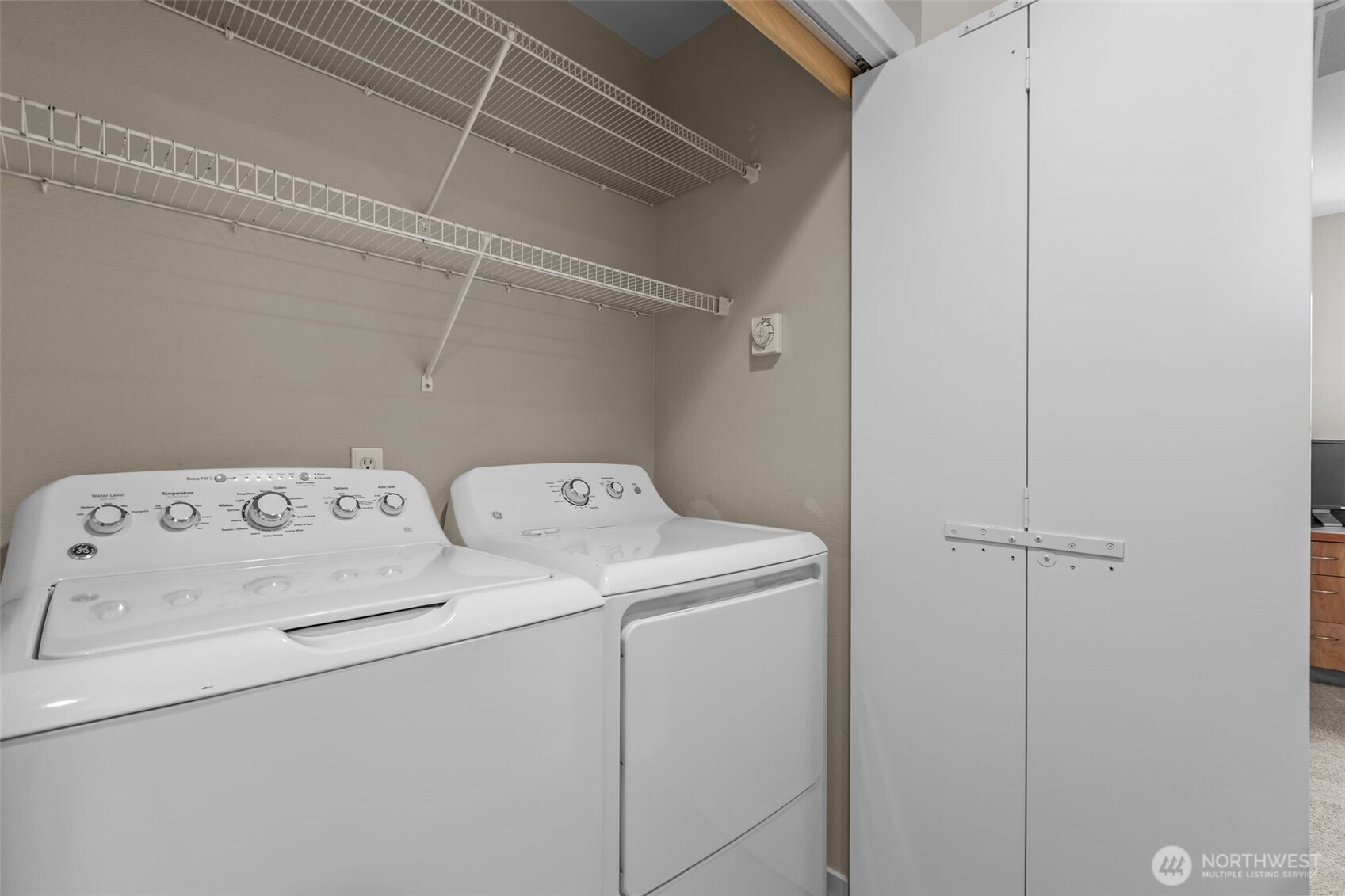 67 Cougar Ridge Road Northwest, Unit 2013 Issaquah, WA 98027 - Photo 21 of 33 a utility room with dryer and washer