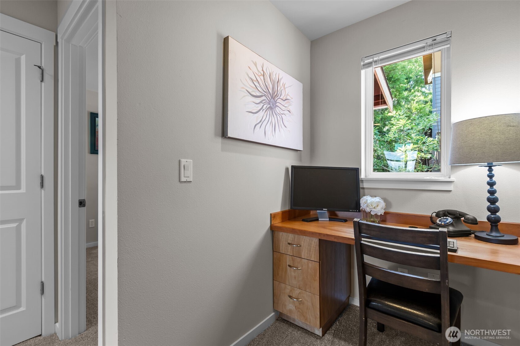 67 Cougar Ridge Road Northwest, Unit 2013 Issaquah, WA 98027 - Photo 22 of 33 a view of a workspace with furniture and a window