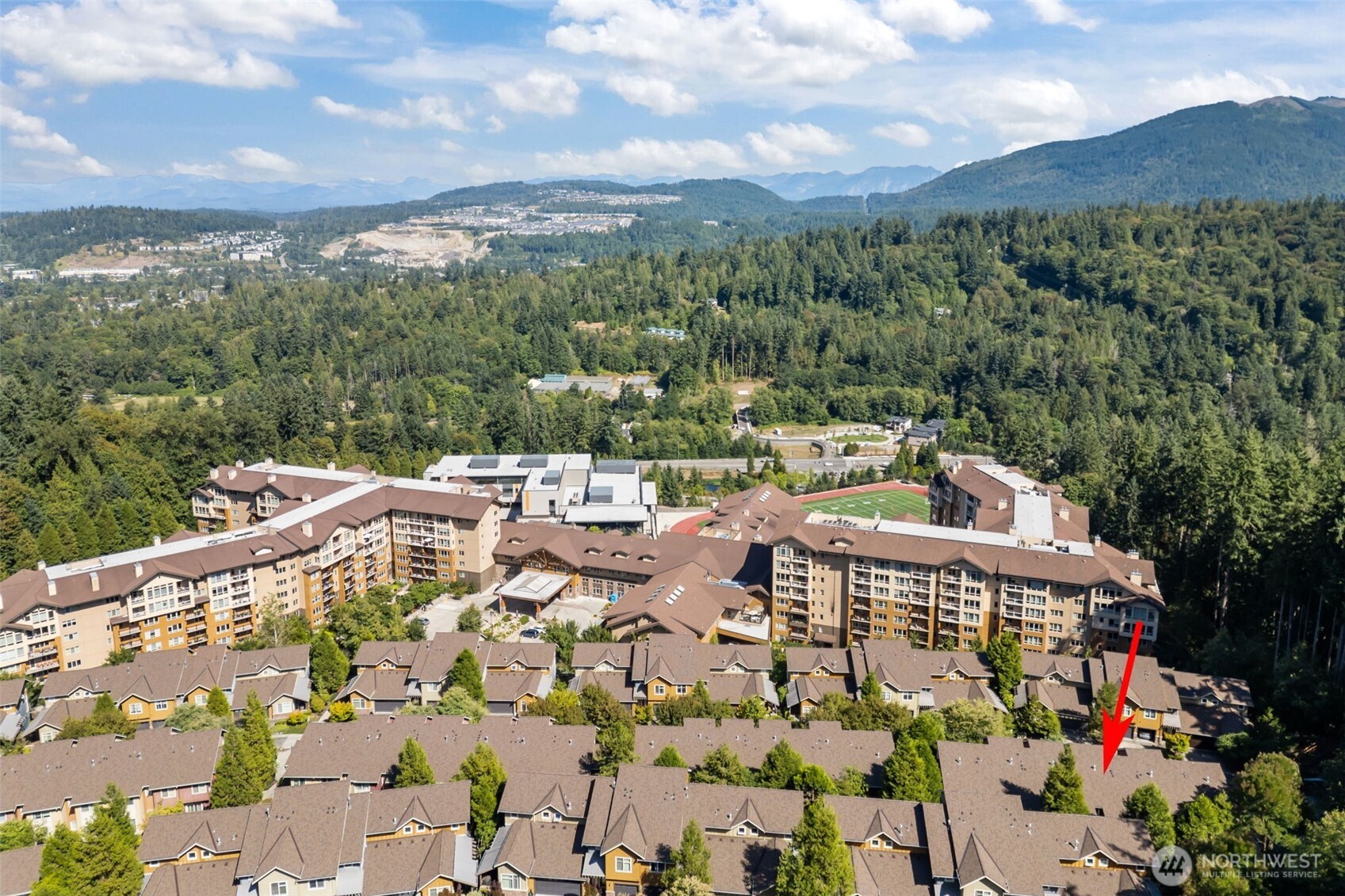 67 Cougar Ridge Road Northwest, Unit 2013 Issaquah, WA 98027 - Photo 32 of 33 a view of a terrace with sitting area