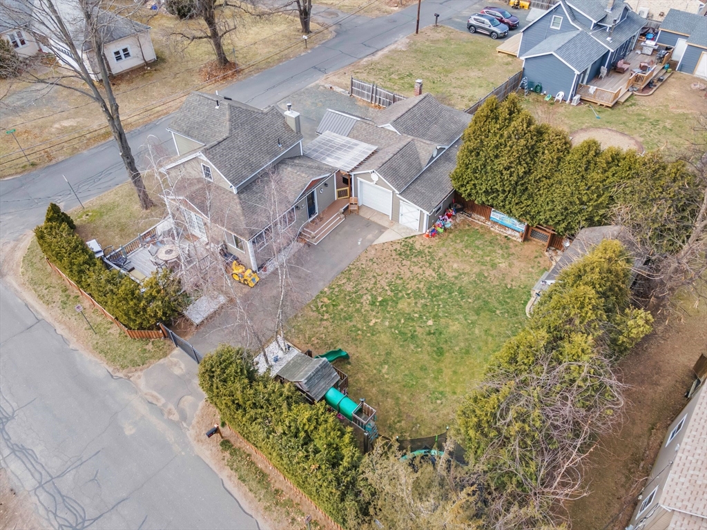 an aerial view of residential house with outdoor space