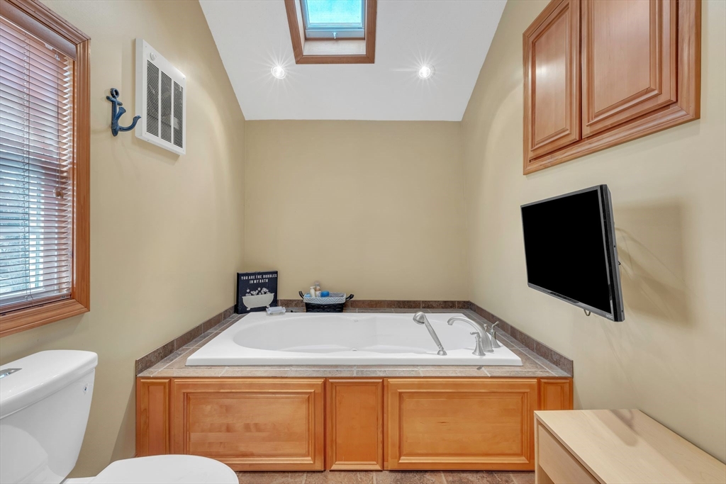 6 Babb Road Southwick, MA 01077 - Photo 25 of 42 a bathroom with a sink and a toilet