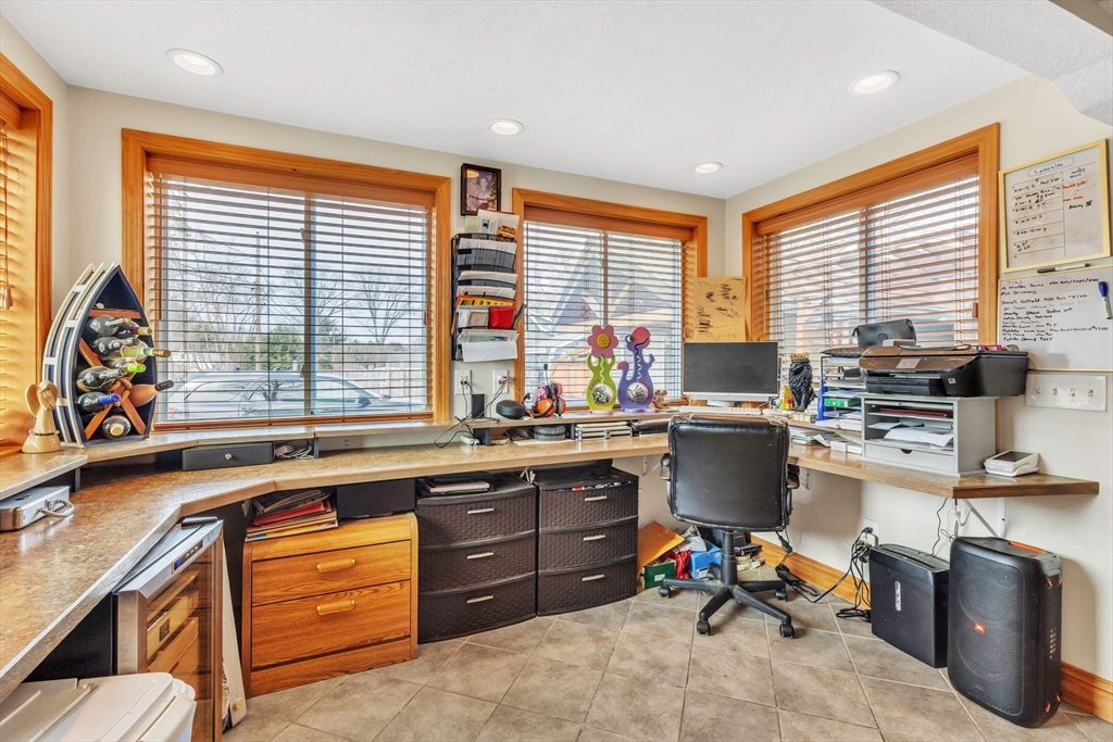 6 Babb Road Southwick, MA 01077 - Photo 27 of 42 a kitchen that has a lot of cabinets in it and a window