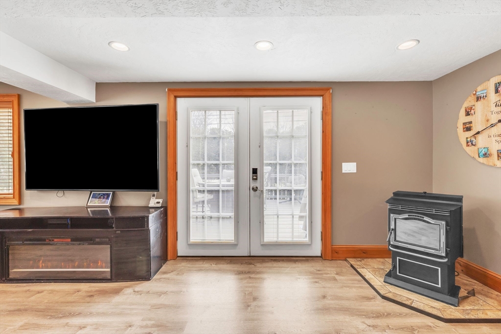 6 Babb Road Southwick, MA 01077 - Photo 34 of 42 a living room with furniture and a flat screen tv
