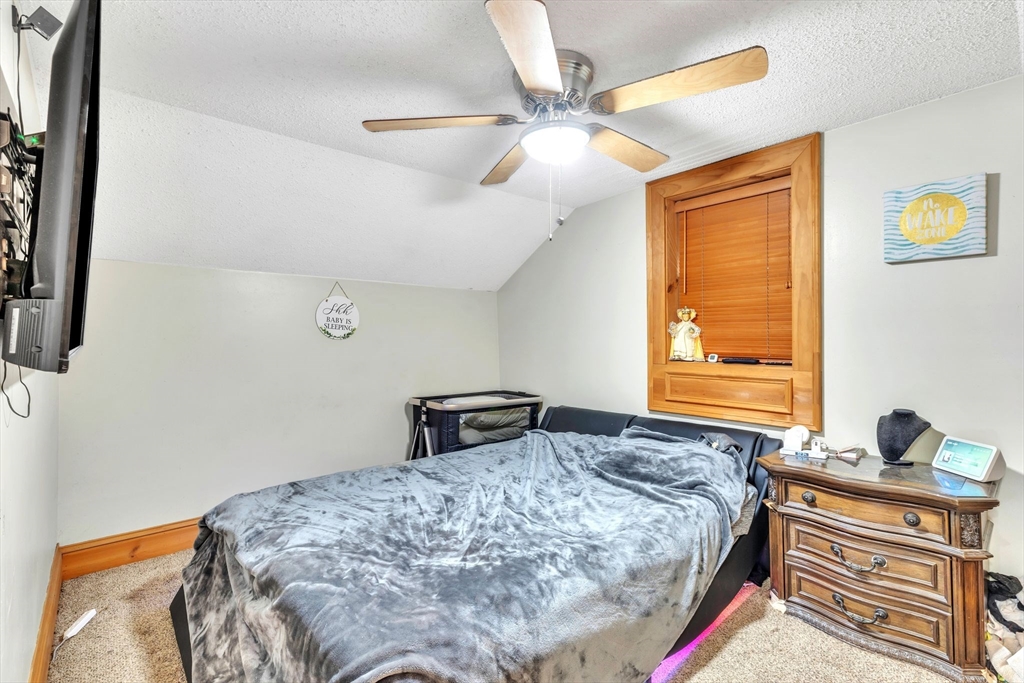 6 Babb Road Southwick, MA 01077 - Photo 36 of 42 a bedroom with a bed and a window