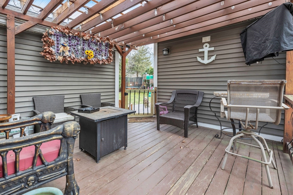 6 Babb Road Southwick, MA 01077 - Photo 39 of 42 a view of a chairs and table in a balcony