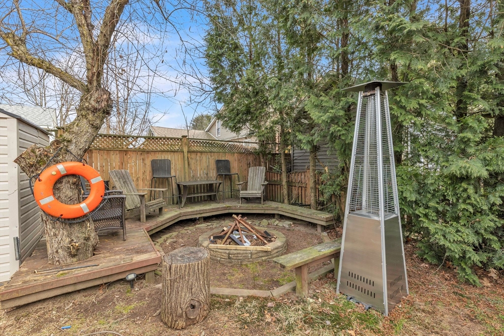 6 Babb Road Southwick, MA 01077 - Photo 42 of 42 a view of a house with backyard and a fire pit
