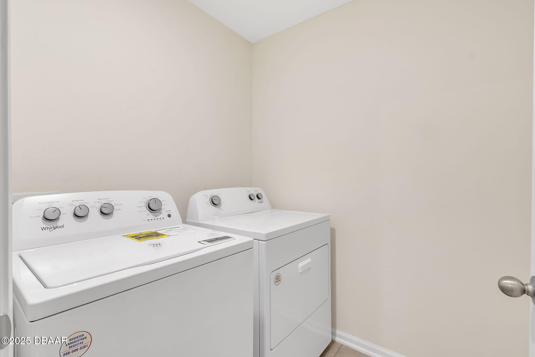 144 Redbud Road Palm Coast, FL 32137 - Photo 25 of 47 a utility room with dryer and washer