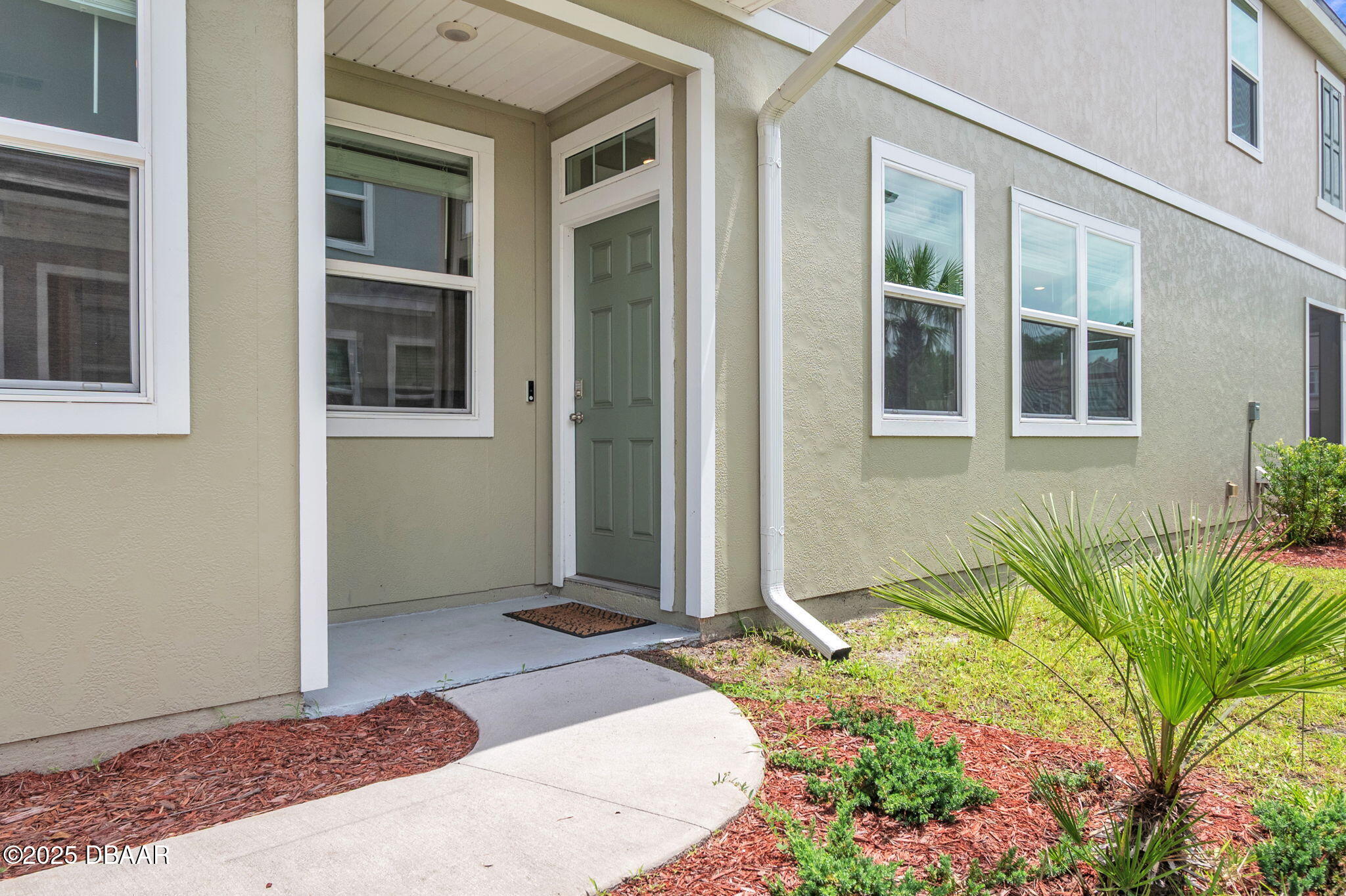 144 Redbud Road Palm Coast, FL 32137 - Photo 3 of 47 a front view of a house