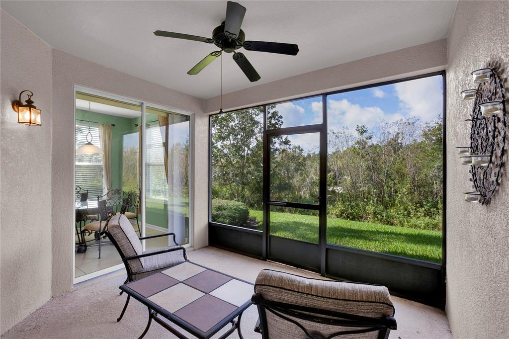 1278 Grady Lane Davenport, FL 33896 - Photo 10 of 17 a living room with hardwood floor and balcony view