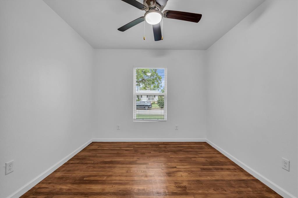 2305 Joey Street Waco, TX 76711 - Photo 17 of 22 a view of empty room with wooden floor