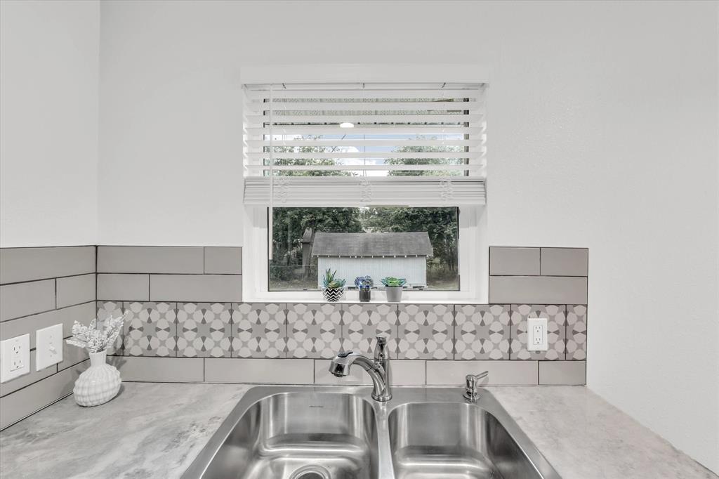 2305 Joey Street Waco, TX 76711 - Photo 10 of 22 a bathroom with a sink and a vanity