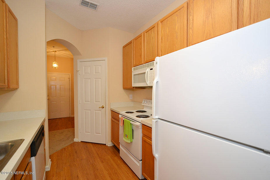 10550 Baymeadows Road, Unit 404 Jacksonville, FL 32256 - Photo 11 of 31 Kitchen View 2 w/Pantry