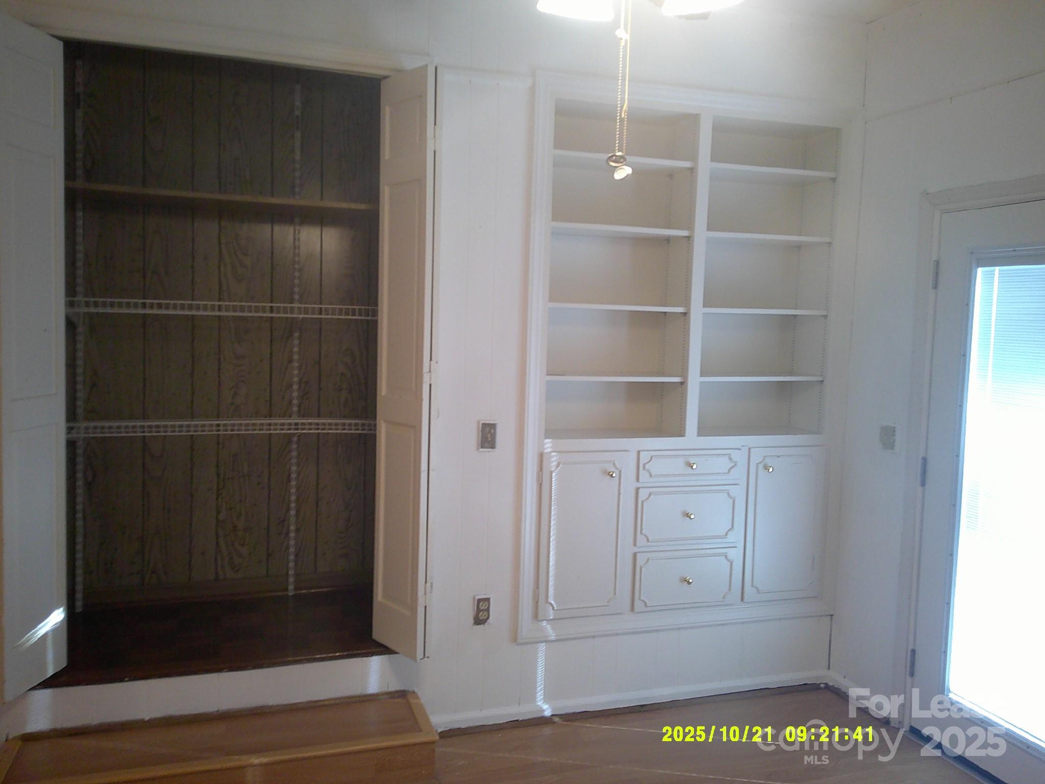 1820 12th Street Northeast Hickory, NC 28601 - Photo 11 of 20 a view of walk in closet with empty racks