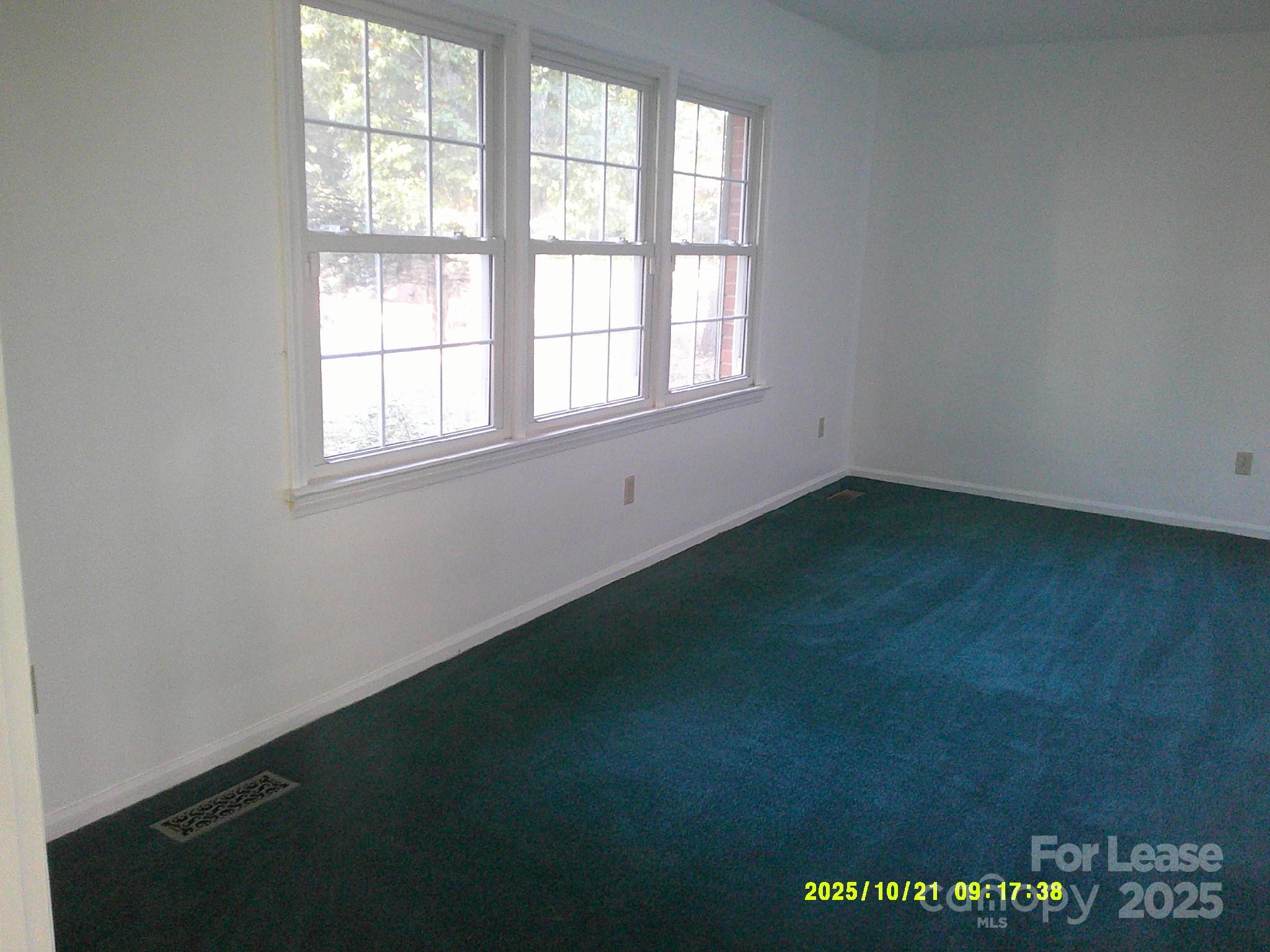 1820 12th Street Northeast Hickory, NC 28601 - Photo 5 of 20 an empty room with a window