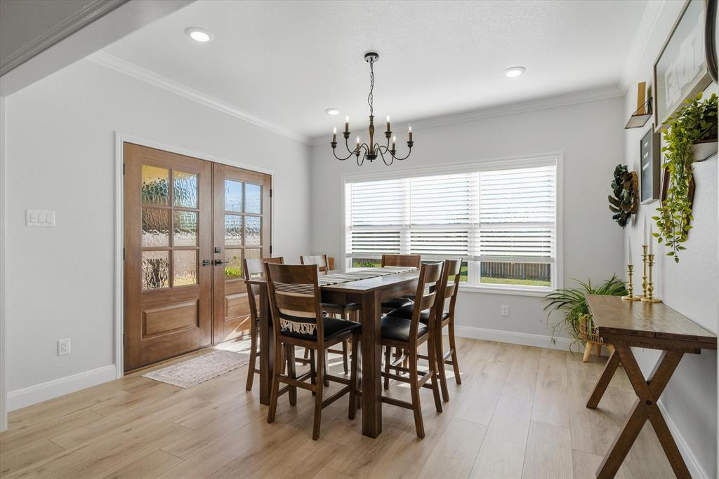 1825 Meadowview Canton, TX 75103 - Photo 15 of 36 a view of a dining room with furniture window and wooden floor