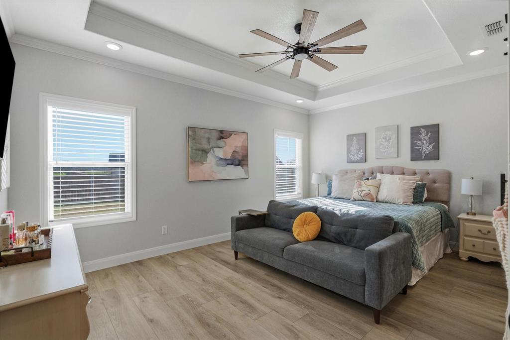 1825 Meadowview Canton, TX 75103 - Photo 22 of 36 a living room with furniture a bed and a window