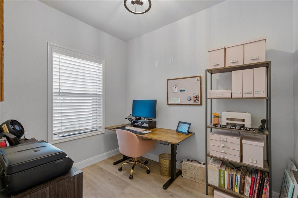 1825 Meadowview Canton, TX 75103 - Photo 30 of 36 a view of a workspace with furniture and a window