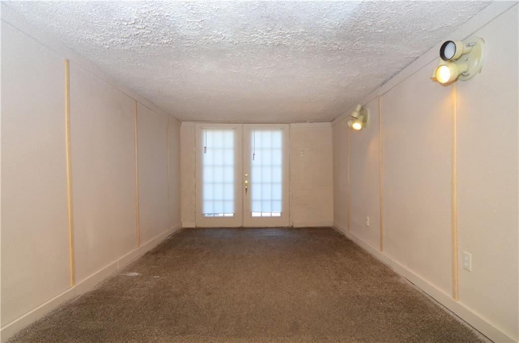 19 Rhodes Avenue Pittsburgh, PA 15220 - Photo 22 of 24 Finished basement/gameroom.