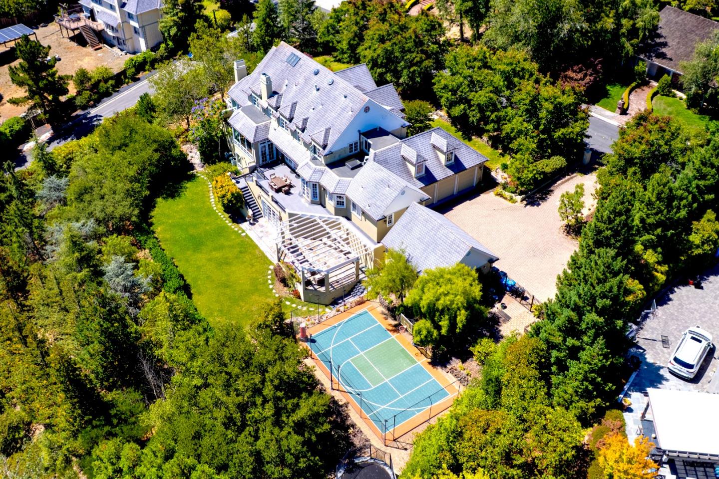 1215 Tournament Drive Hillsborough, CA 94010 - Photo 11 of 16 an aerial view of a house with a yard