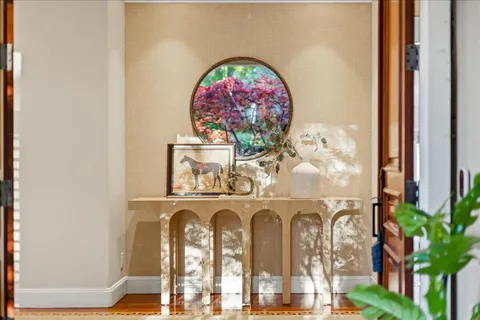 a kitchen with a table and chairs