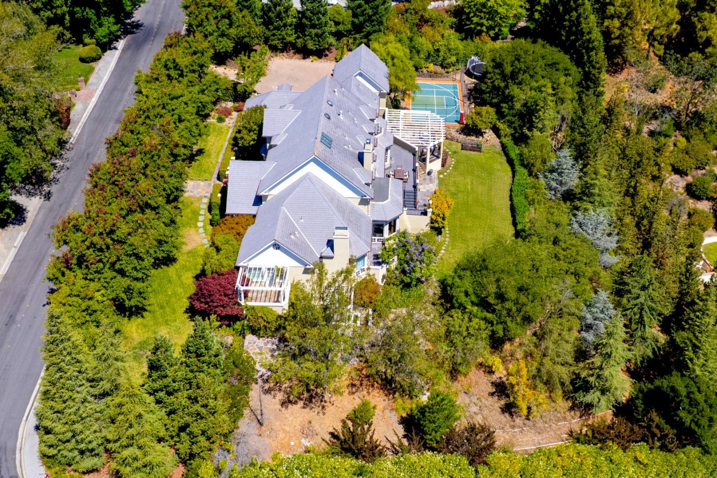 1215 Tournament Drive Hillsborough, CA 94010 - Photo 6 of 16 an aerial view of residential houses with outdoor space and trees