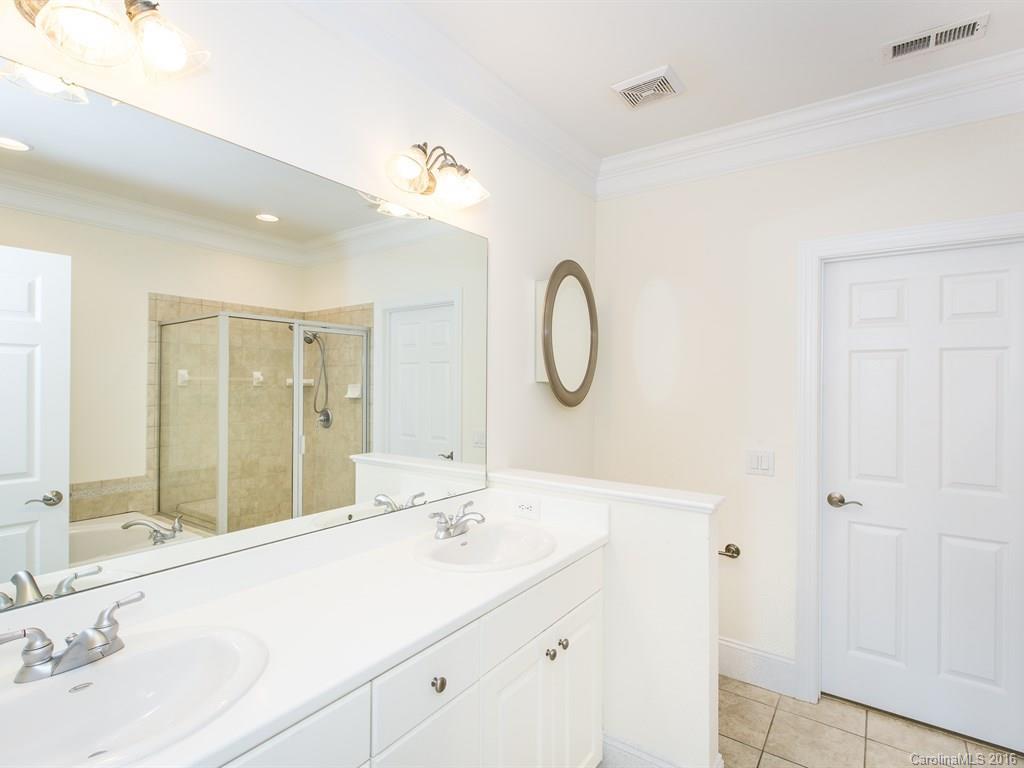 609 Crosswater Lane Fort Mill, SC 29708 - Photo 12 of 24 a bathroom with a double vanity sink mirror and double