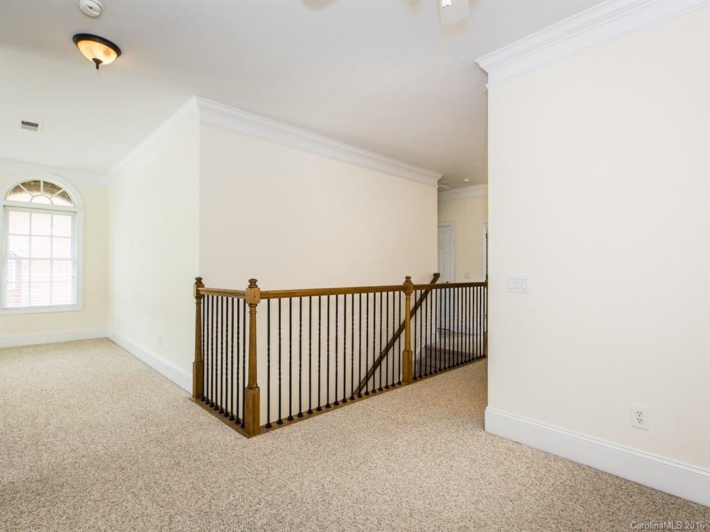 609 Crosswater Lane Fort Mill, SC 29708 - Photo 14 of 24 a view of a room with sliding window