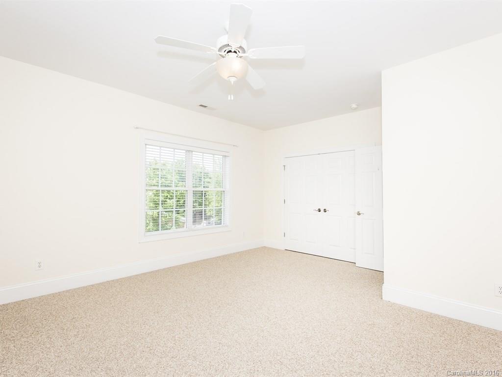 609 Crosswater Lane Fort Mill, SC 29708 - Photo 15 of 24 an empty room with a window