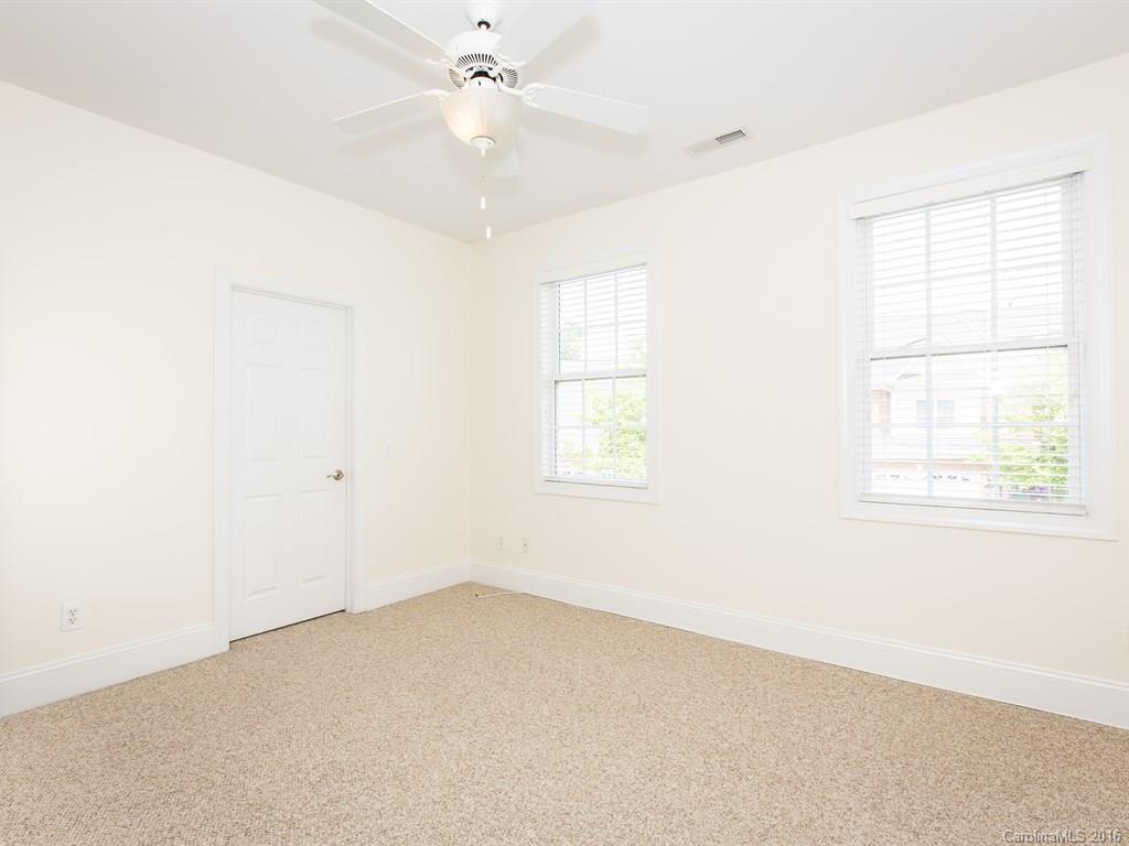 609 Crosswater Lane Fort Mill, SC 29708 - Photo 16 of 24 an empty room with a window and a fan