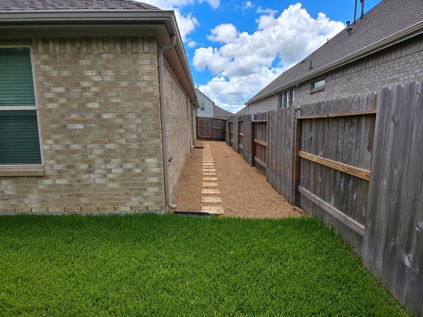 5035 Sierra Ridge Drive Rosenberg, TX 77469 - Photo 23 of 26 Side Backyard walkway