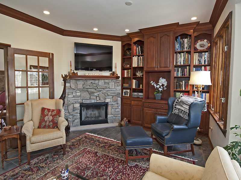 10 Midway Road Mt. Lebanon, PA 15216 - Photo 7 of 16 Family Room. Log burning fireplace, custom cabinetry, wet bar, and French windows and doors.