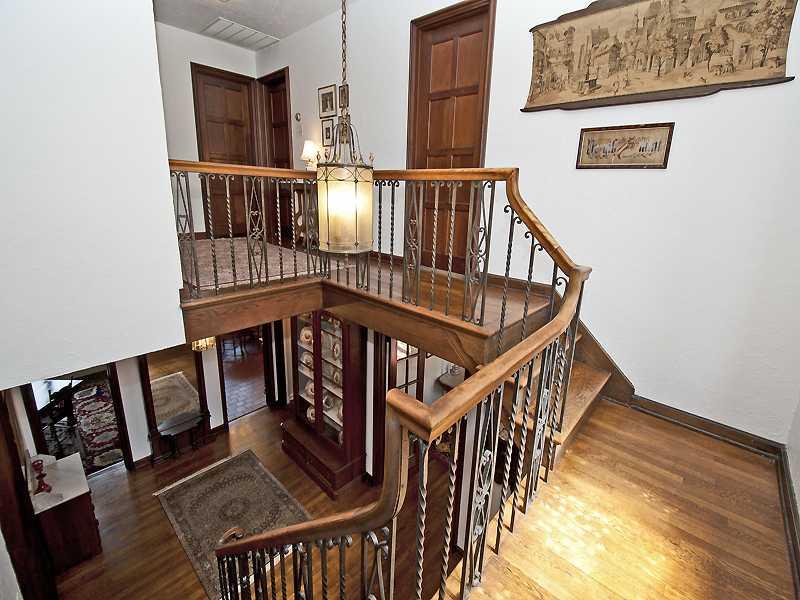 10 Midway Road Mt. Lebanon, PA 15216 - Photo 10 of 16 Entry/Foyer. Bull s Eye Oriel Window providing light and privacy, window seat, vintage chandelier, decorative wrought iron, all representative of the exceptional original detailing.