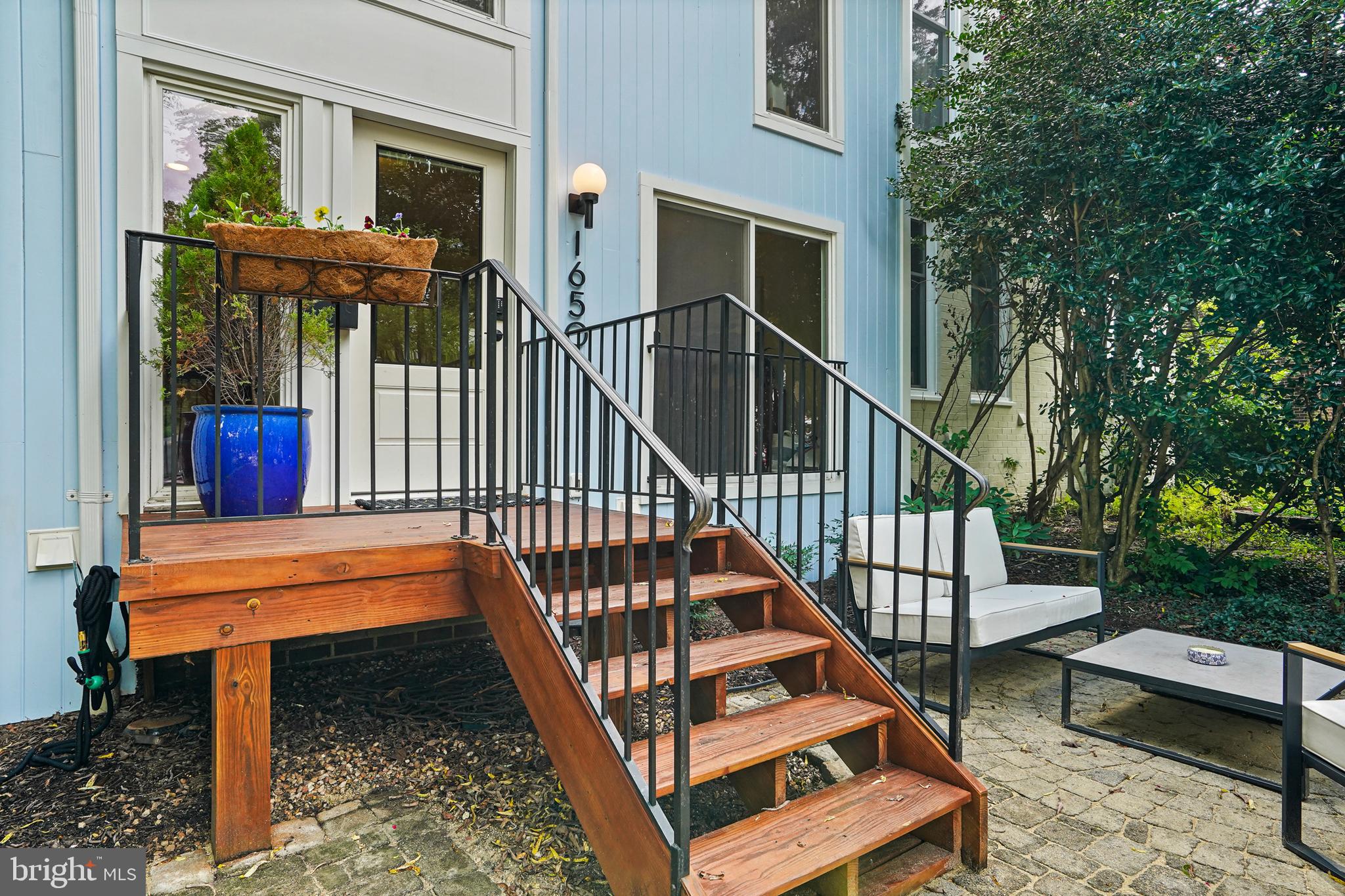 1650 Wainwright Drive Reston, VA 20190 - Photo 4 of 52 Iron railings add a bit of character to the deckin