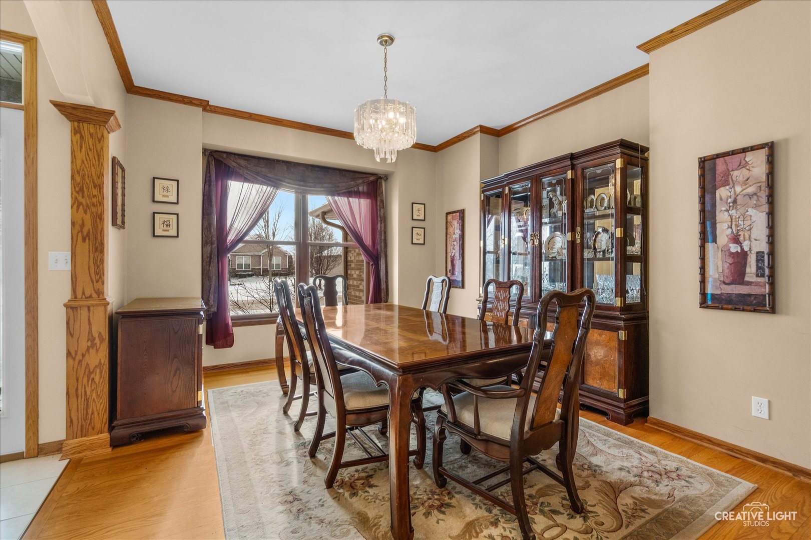 457 Davis Drive Sycamore, IL 60178 - Photo 11 of 32 a view of a dining room with furniture window and wooden floor