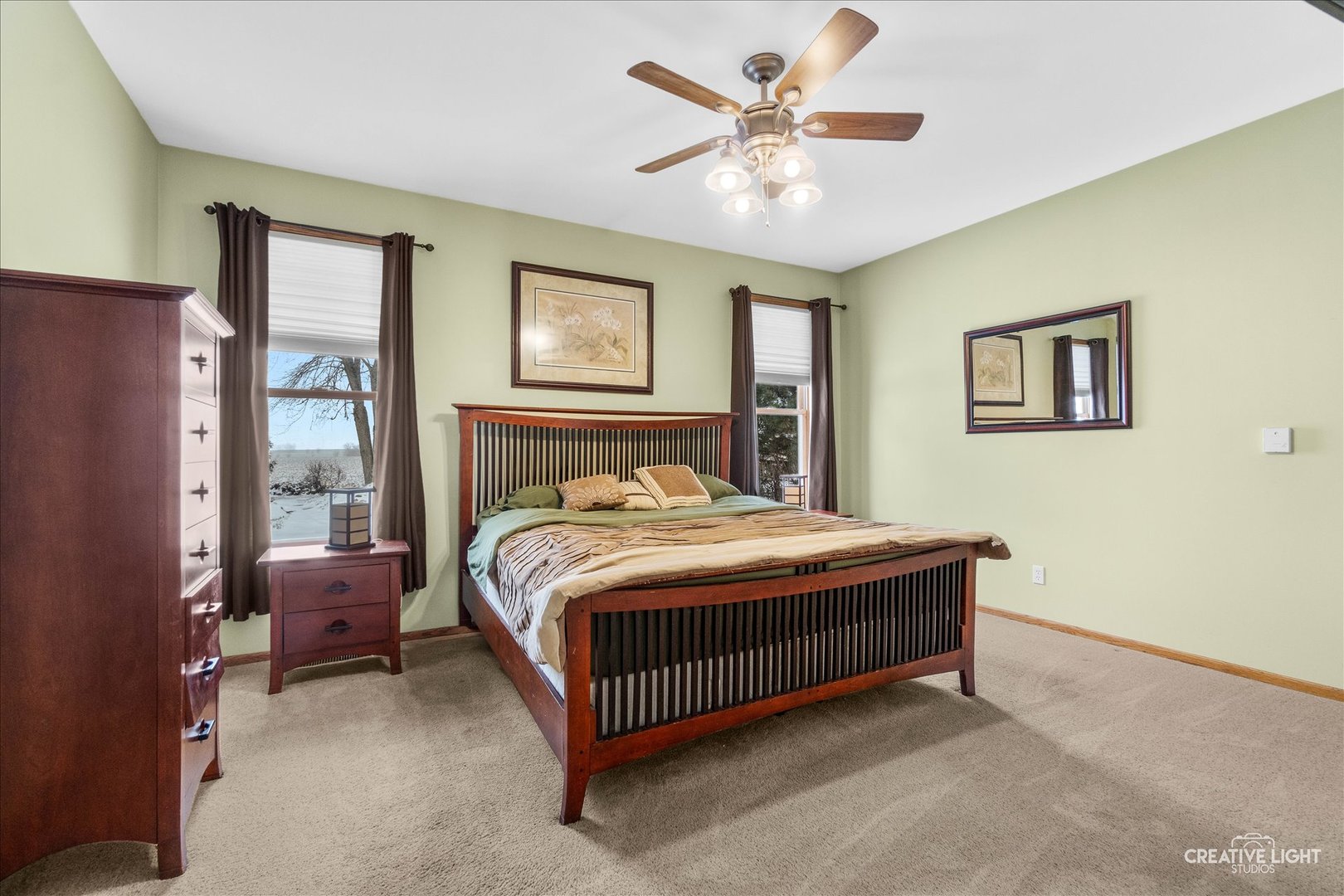 457 Davis Drive Sycamore, IL 60178 - Photo 14 of 32 a bedroom with a bed dresser and a window