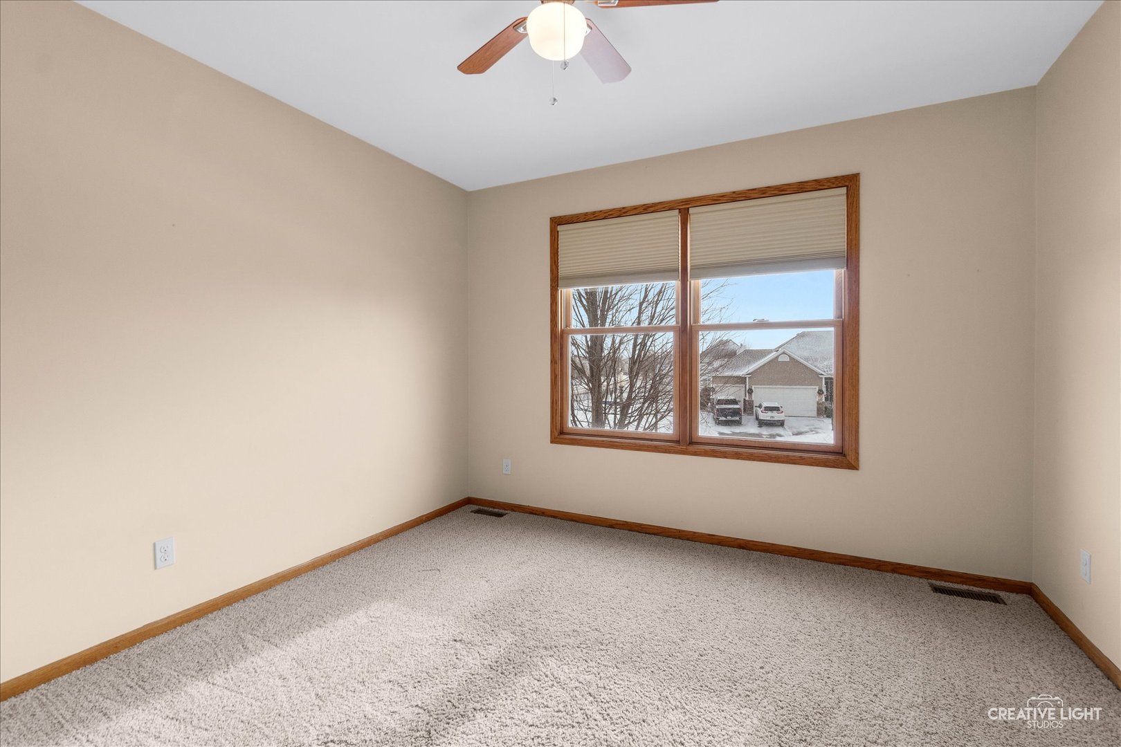457 Davis Drive Sycamore, IL 60178 - Photo 20 of 32 an empty room with a window