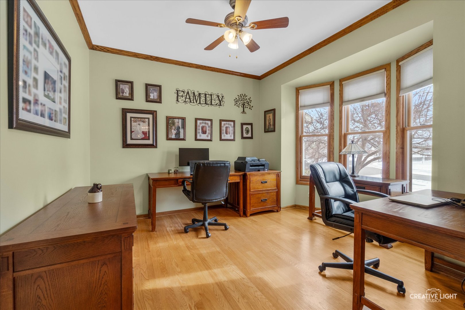 457 Davis Drive Sycamore, IL 60178 - Photo 22 of 32 a view of a workspace with furniture and a window