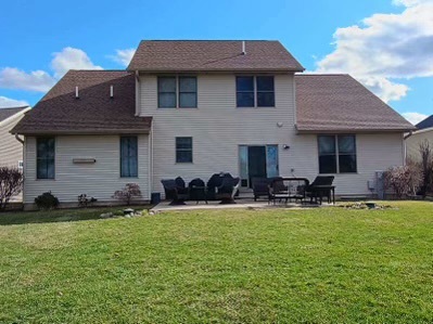 457 Davis Drive Sycamore, IL 60178 - Photo 28 of 32 a front view of a house with a yard