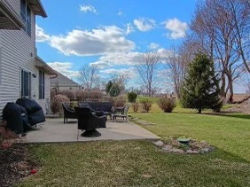 457 Davis Drive Sycamore, IL 60178 - Photo 30 of 32 a view of a backyard with sitting area
