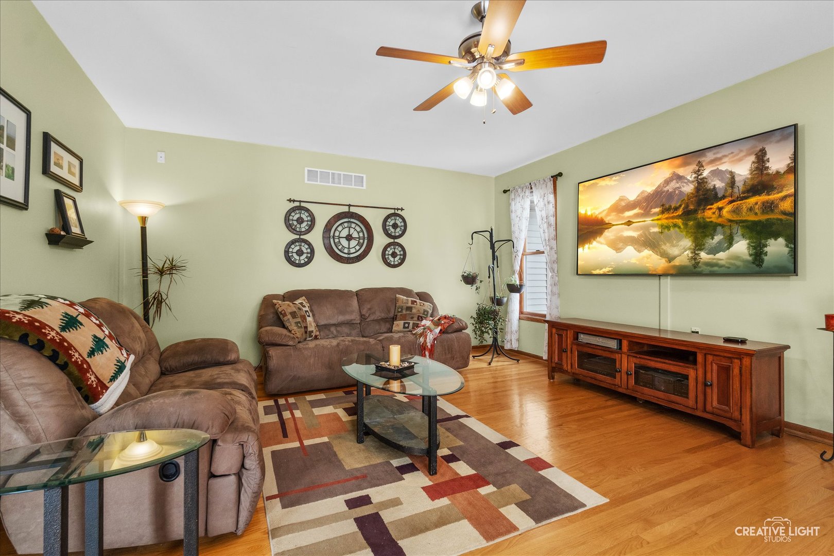 457 Davis Drive Sycamore, IL 60178 - Photo 6 of 32 a living room with couches and a flat screen tv