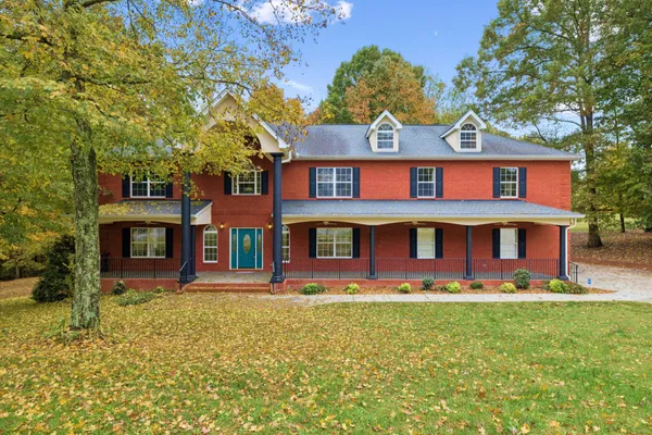 front view of a building with a yard