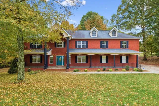 front view of a building with a yard
