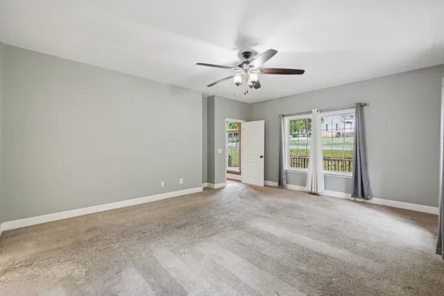 a bathroom with a shower and a sink