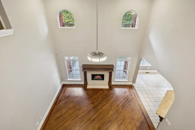 a backyard of a house with lots of trees