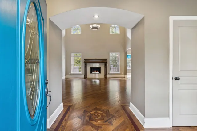 a bedroom with a large bed and a couch