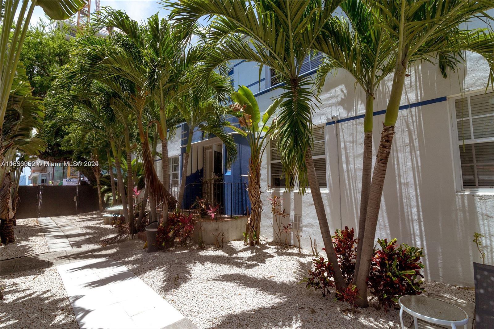 1241 13th Street, Unit 4 Miami Beach, FL 33139 - Photo 13 of 13 a view of a house with small yard