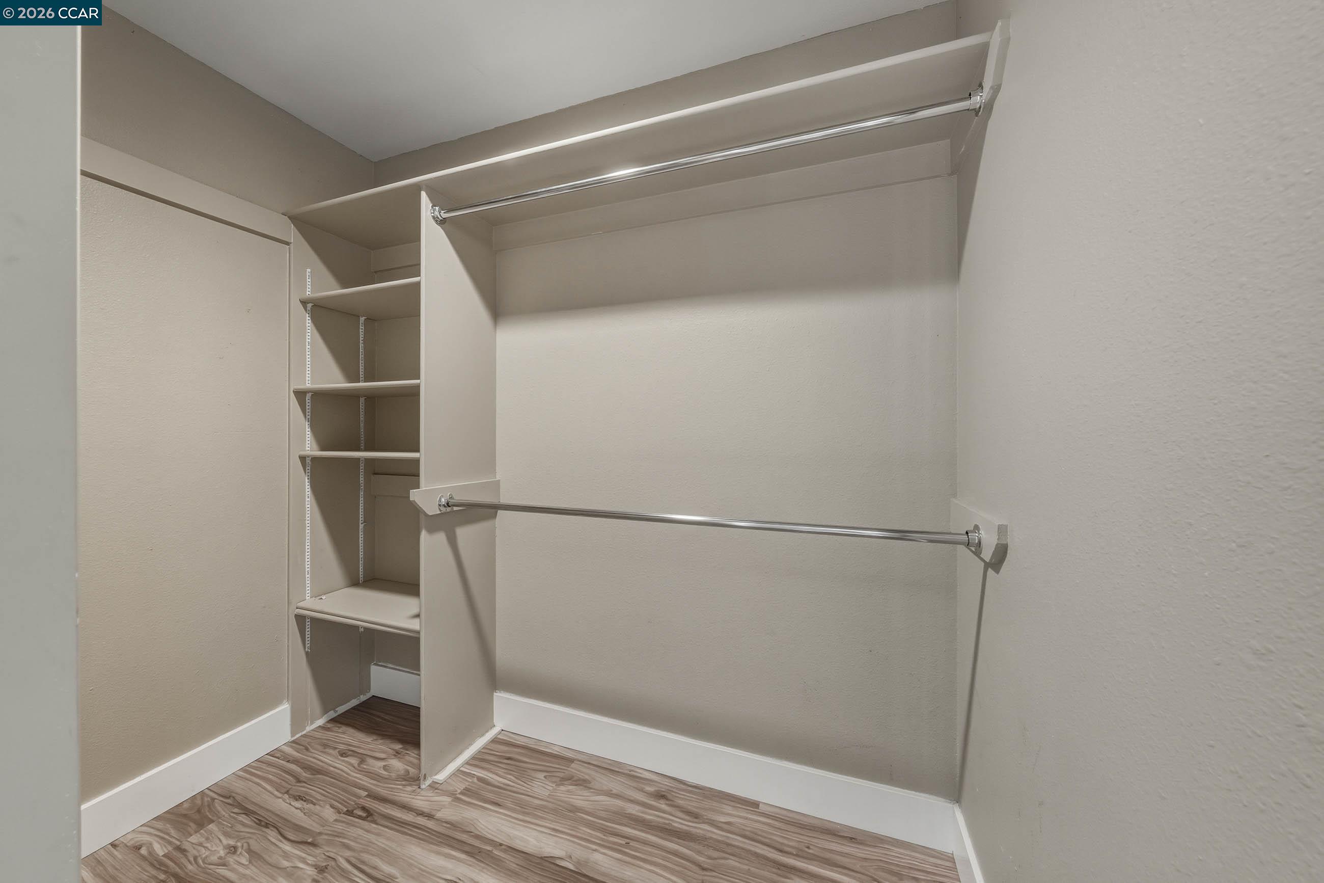 18357 Deer Hill Road Hidden Valley Lake, CA 95467 - Photo 23 of 29 a view of walk in closet with empty racks