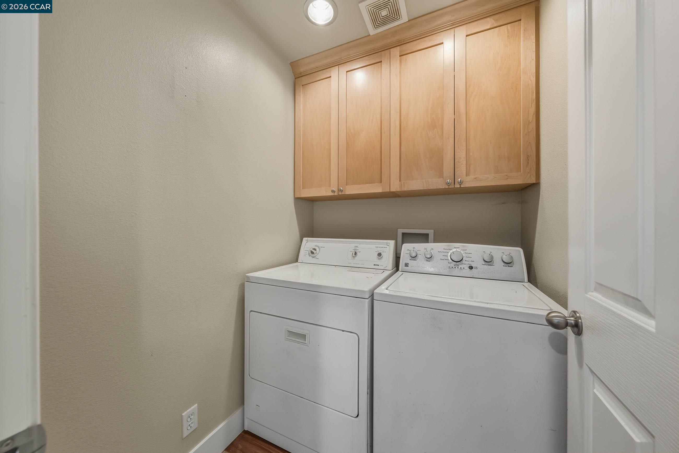 18357 Deer Hill Road Hidden Valley Lake, CA 95467 - Photo 27 of 29 a view of storage and utility room with washer and dryer