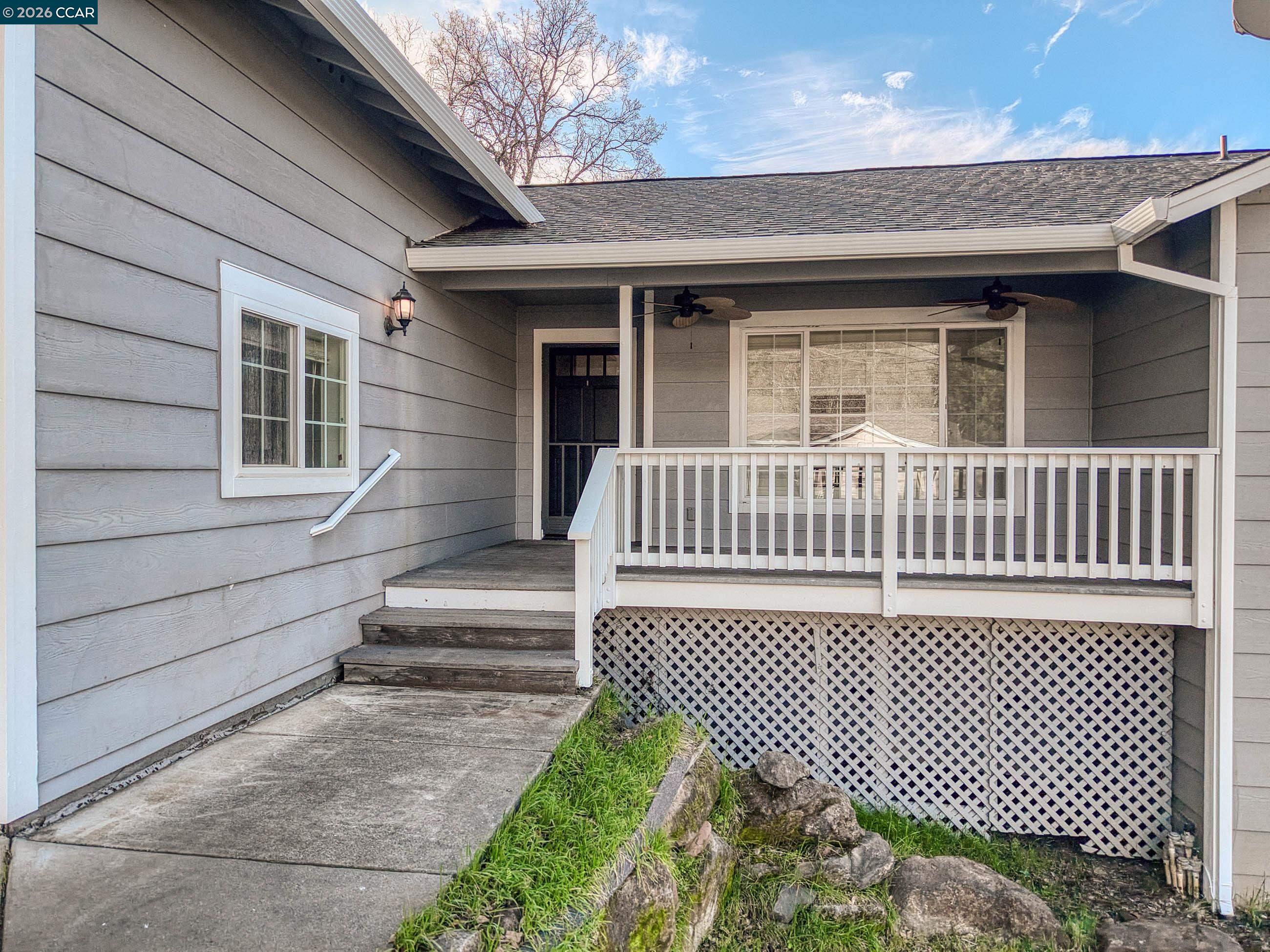 18357 Deer Hill Road Hidden Valley Lake, CA 95467 - Photo 3 of 29 front view of a house