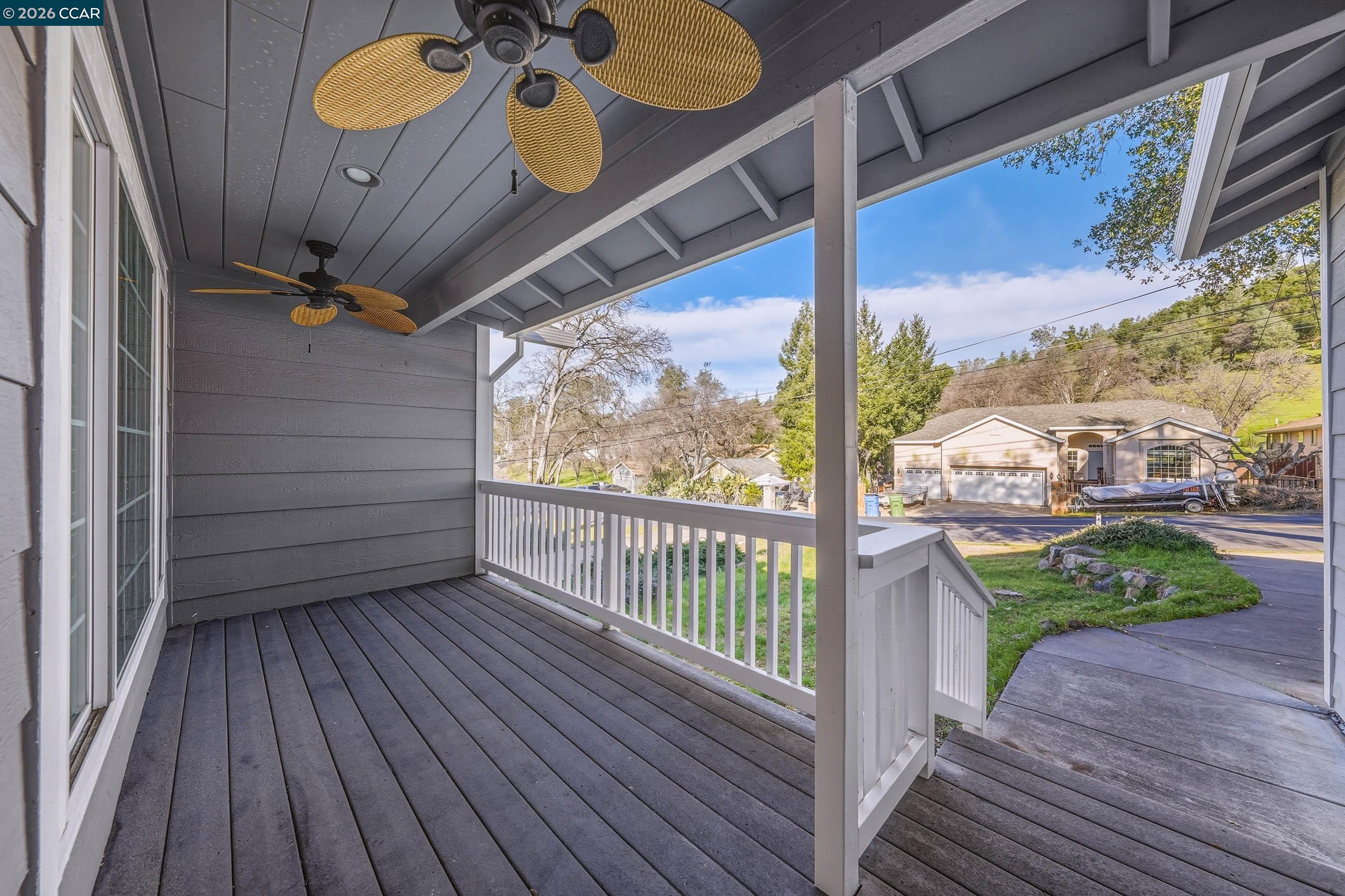 18357 Deer Hill Road Hidden Valley Lake, CA 95467 - Photo 4 of 29 a view of a porch with wooden floor